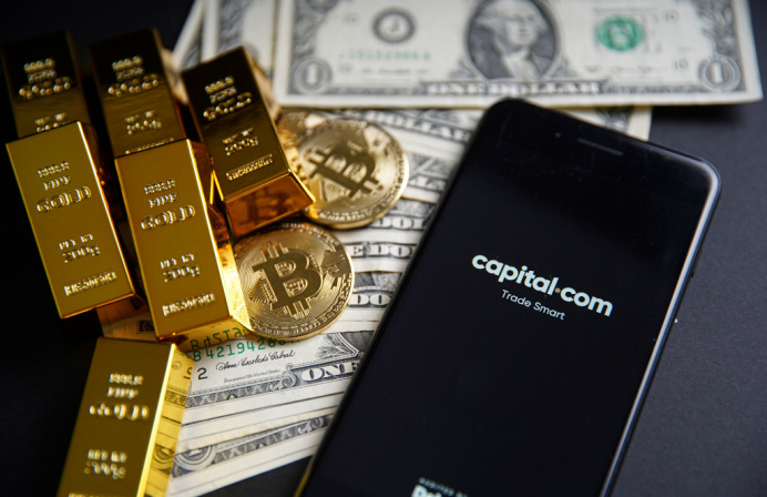 Phone with capital.com and bitcoin